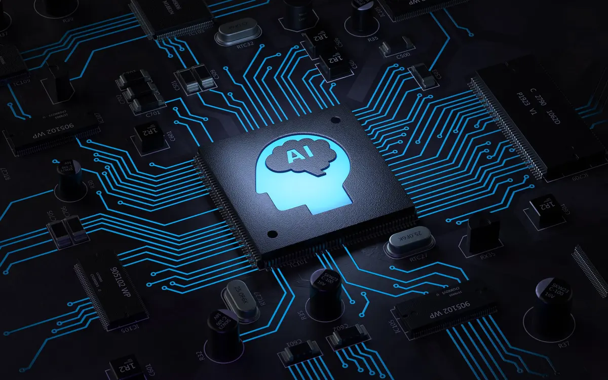 Circuit board with a glowing AI chip shaped like a human head